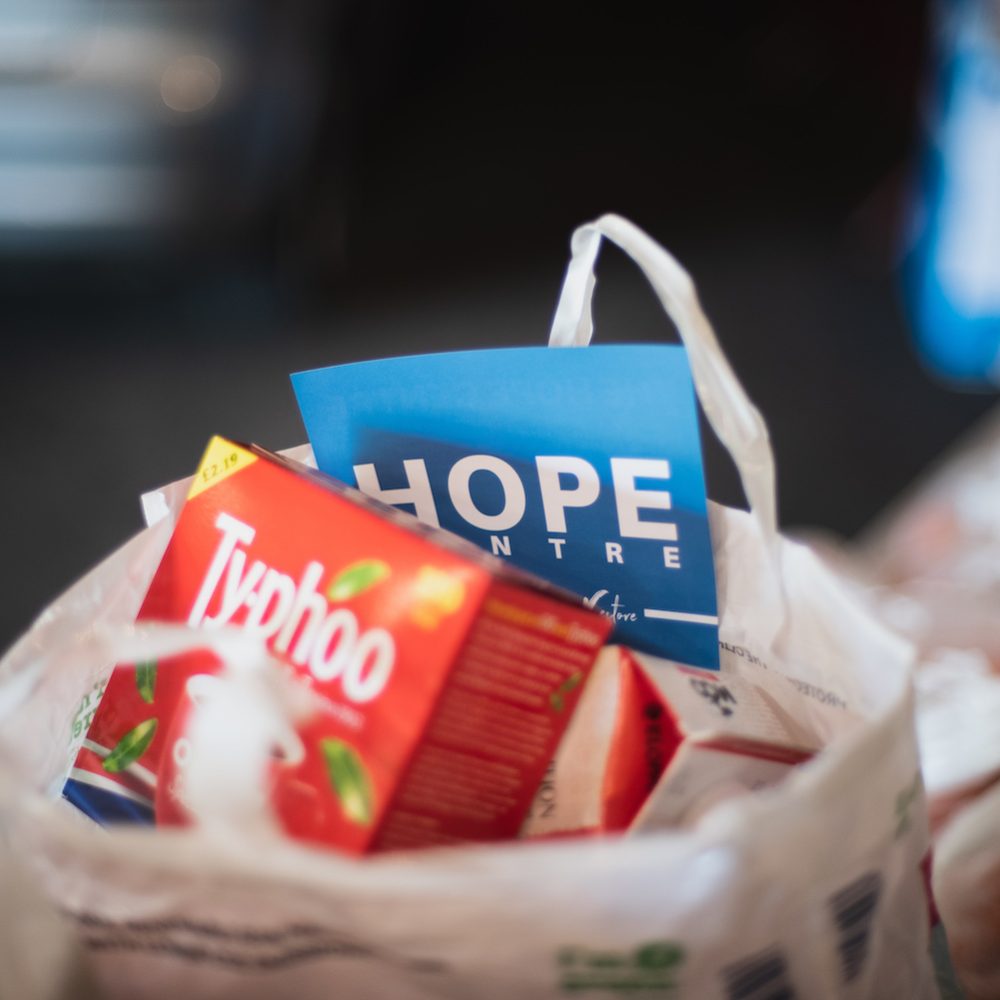 Food Bank Bag with teabags and a flier